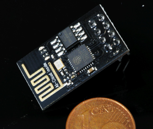 The ESP-01S module used for the coffee machine monitor, next to a coin for scale